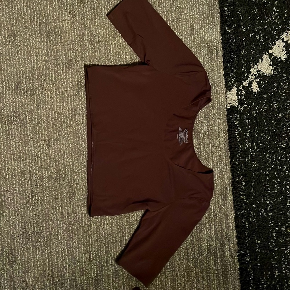 This is a short cropped half sleeve Demi tee.